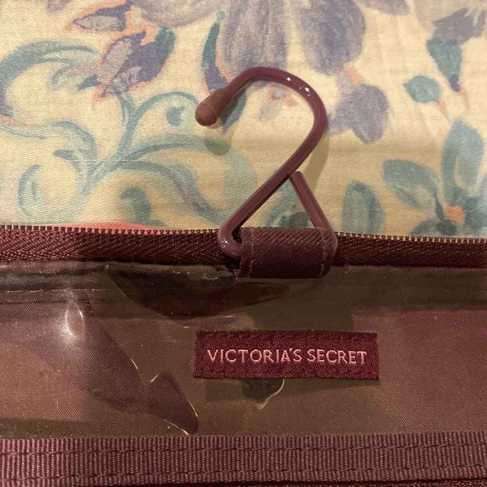 Victoria’s Secret travel case with removable pouches.